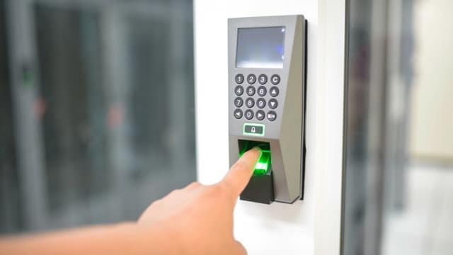 Wall-mounted access control keypad with fingerprint reader